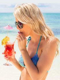 woman drinking cocktail